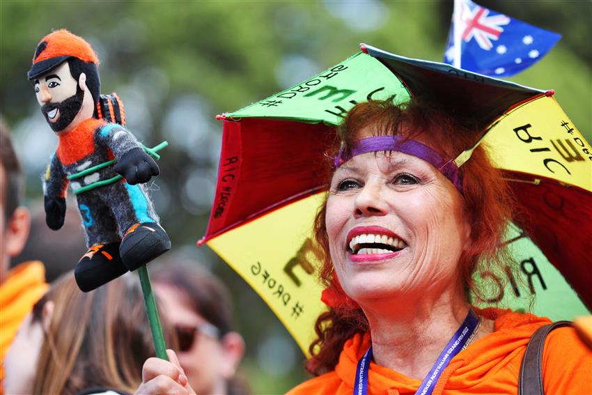 Aussie race fan with homemade toys